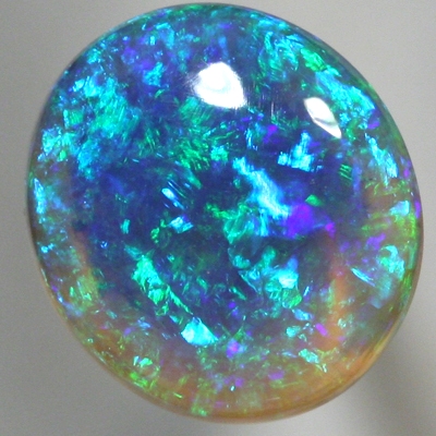 SOLID CRYSTAL OPAL Blue - green Harlequin pattern with greens and blue jumping brightly. With VIDEO